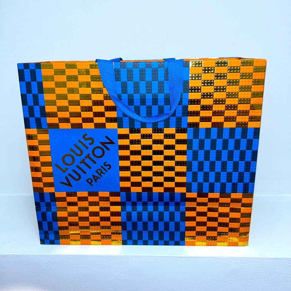 Two Authentic Blue and Orange Louis Vuitton Shopping Bag.
